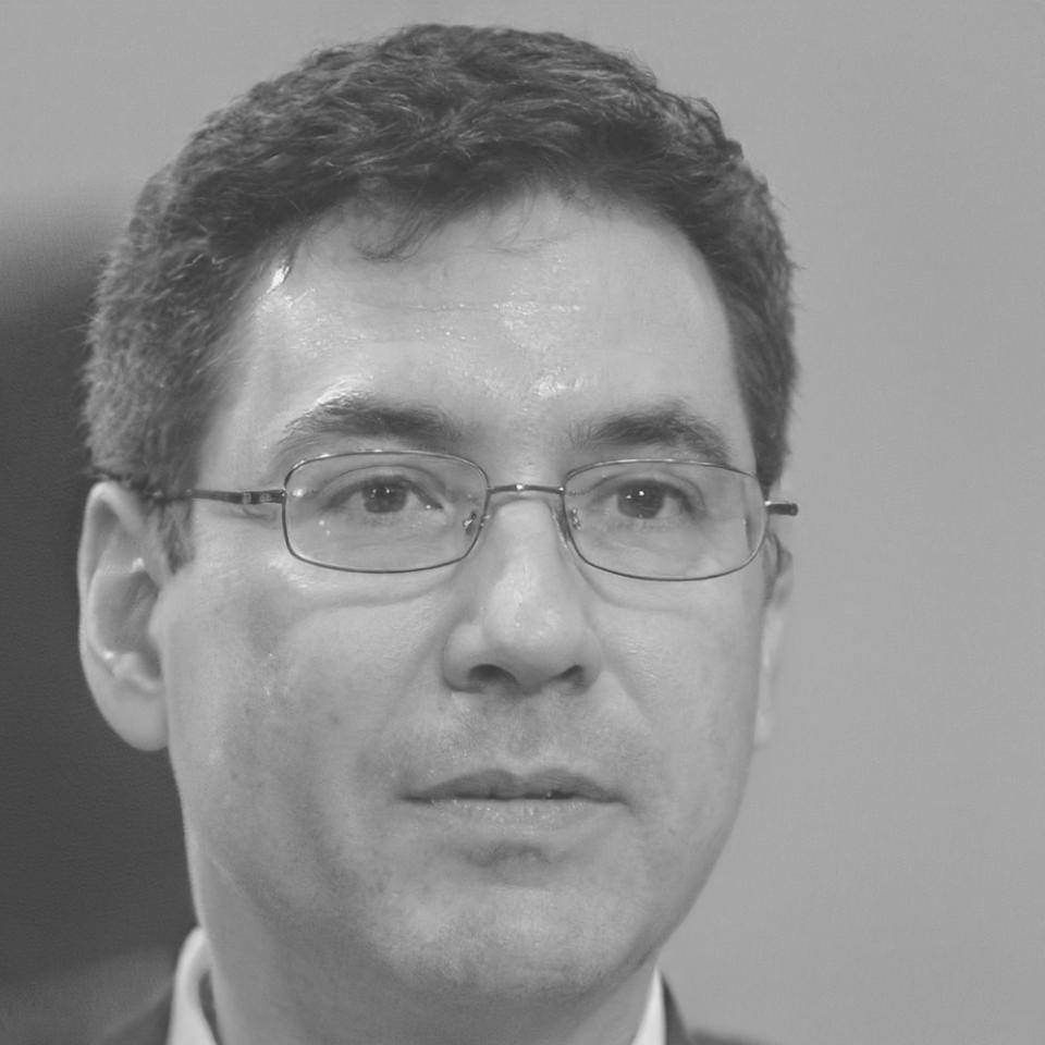 Professional headshot of Kieran Thorne